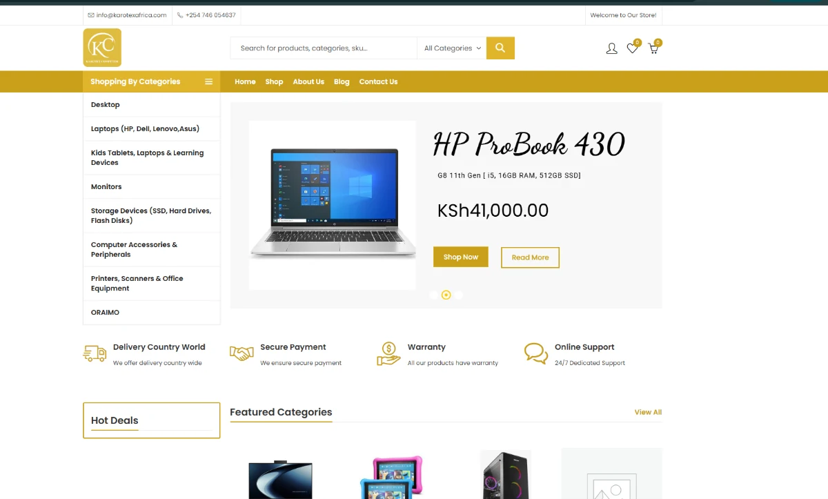 Karotex Computers homepage showing its gold navigation, product search, laptop feature and category list.